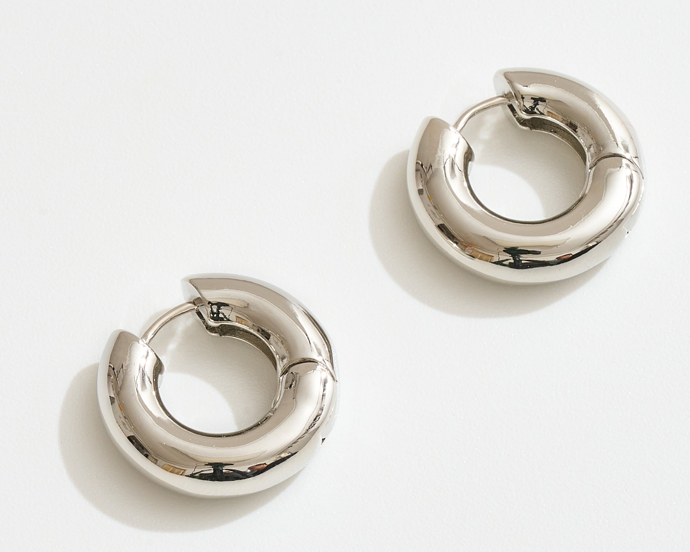 SIGNATURE MINI HOOP EARRINGS JOIA TRADING CO.