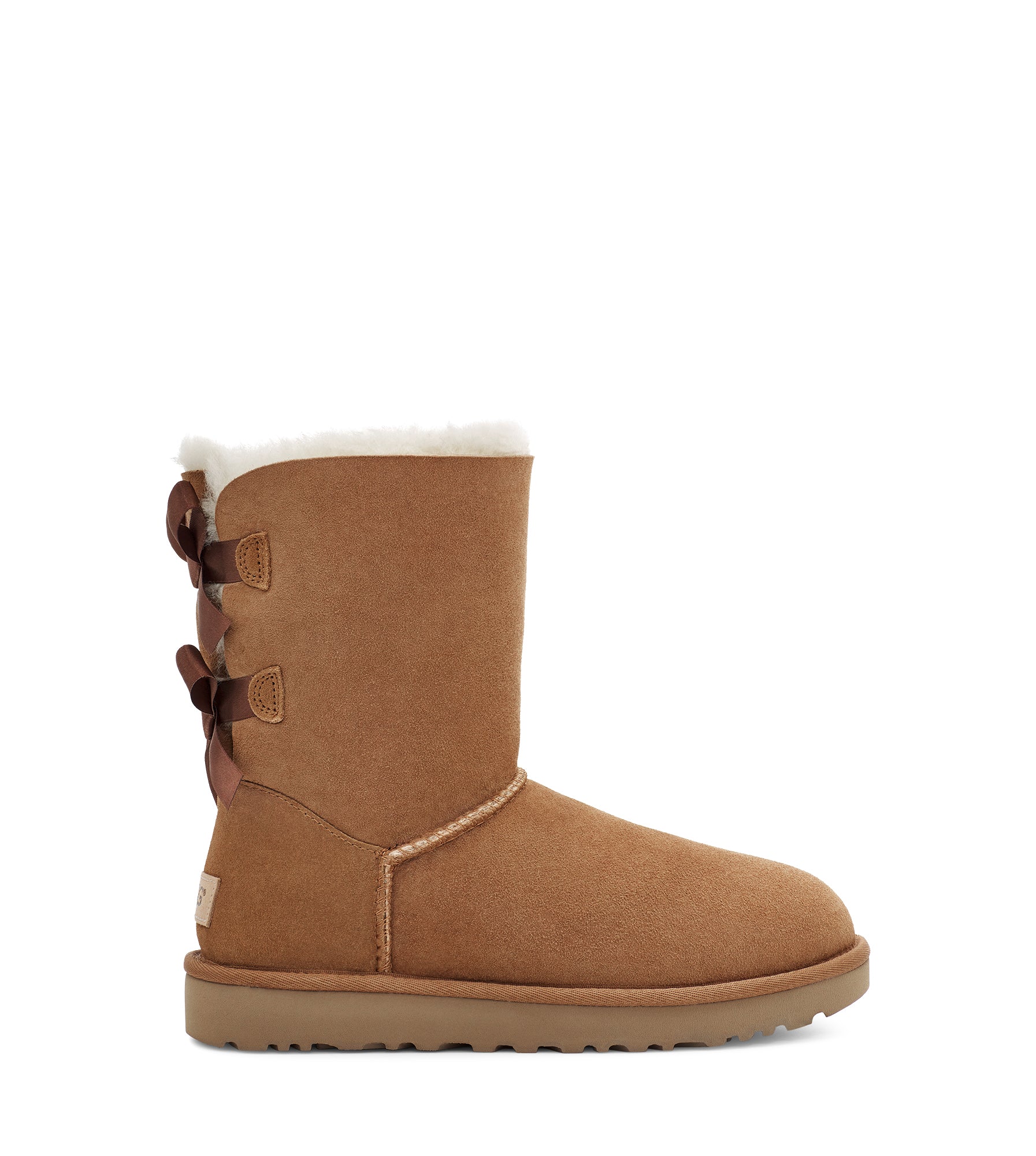 Beige uggs hotsell with bows